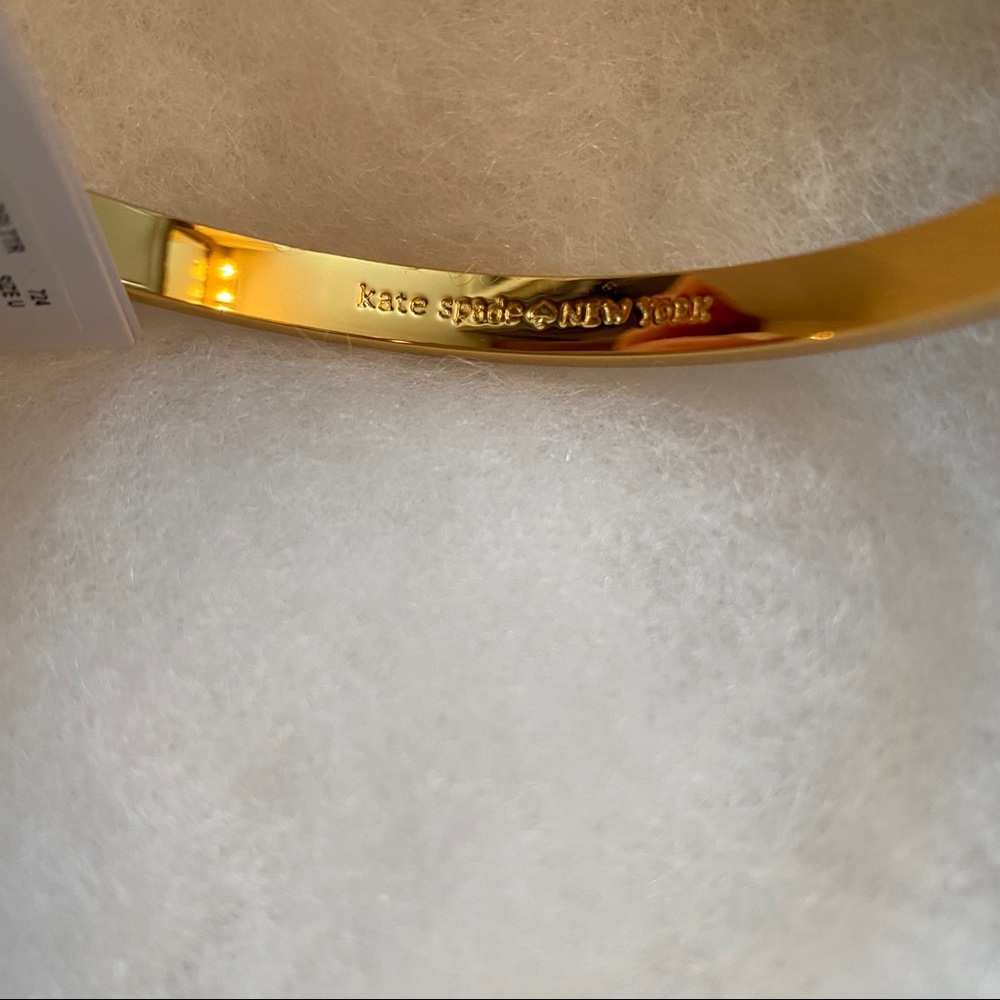 KATE SPADE NEW NWT BRACELET BANGLE GOLD PLATE GLITTER BOW MOON RIVER JEWELRY - Picture 8 of 8